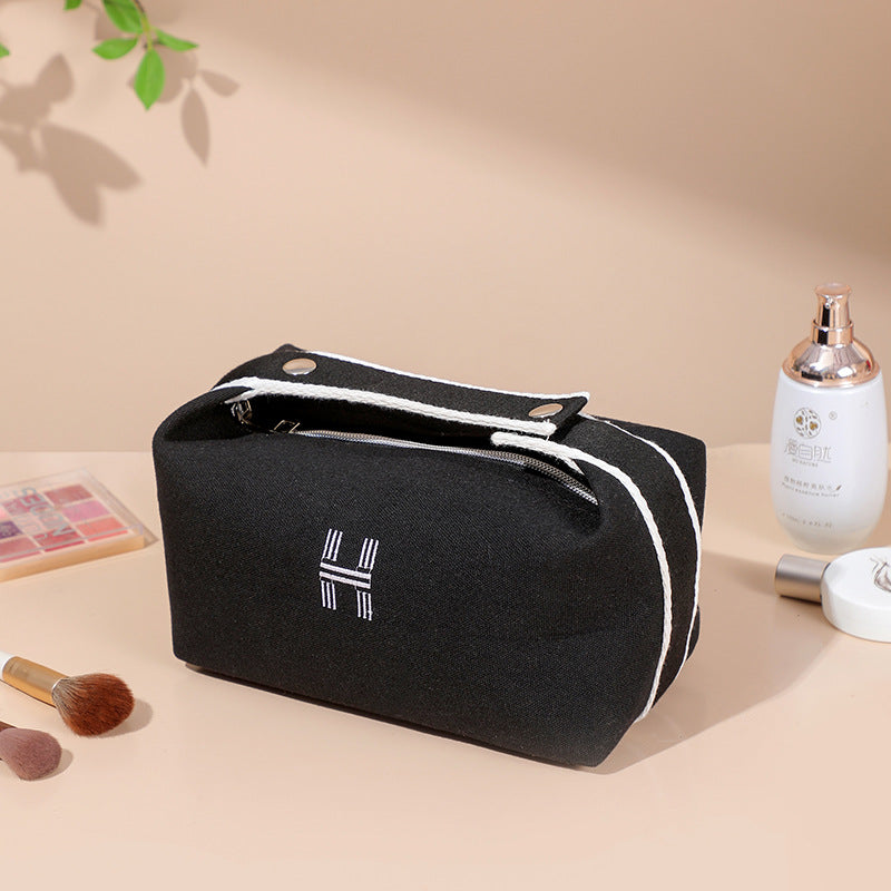 Portable premium canvas makeup bag, large capacity, washable, stylish storage for women